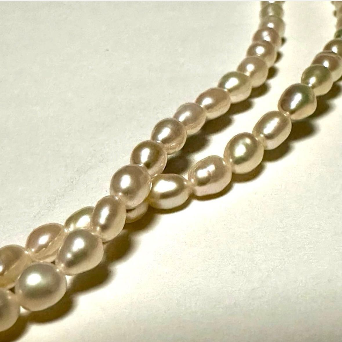 Tasaki Law two-strand white freshwater pearl necklace with silver clasp, 42.5 cm length