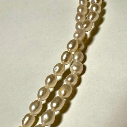 Tasaki Law two-strand white freshwater pearl necklace with silver clasp, 42.5 cm length