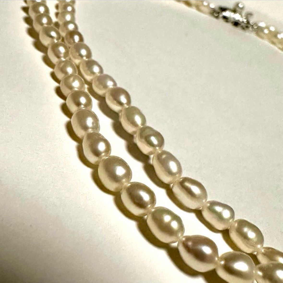 Tasaki Law two-strand white freshwater pearl necklace with silver clasp, 42.5 cm length
