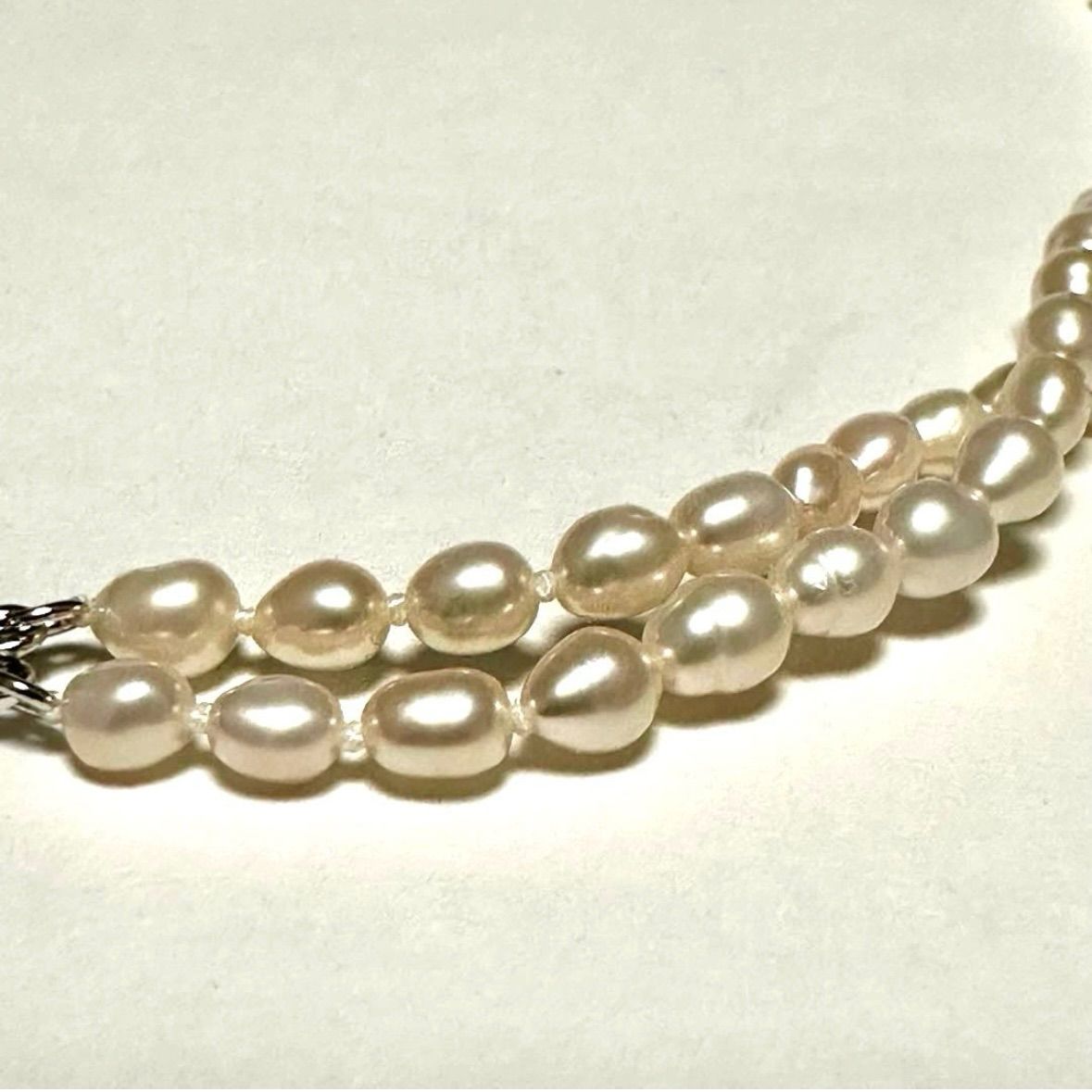 Tasaki Law two-strand white freshwater pearl necklace with silver clasp, 42.5 cm length