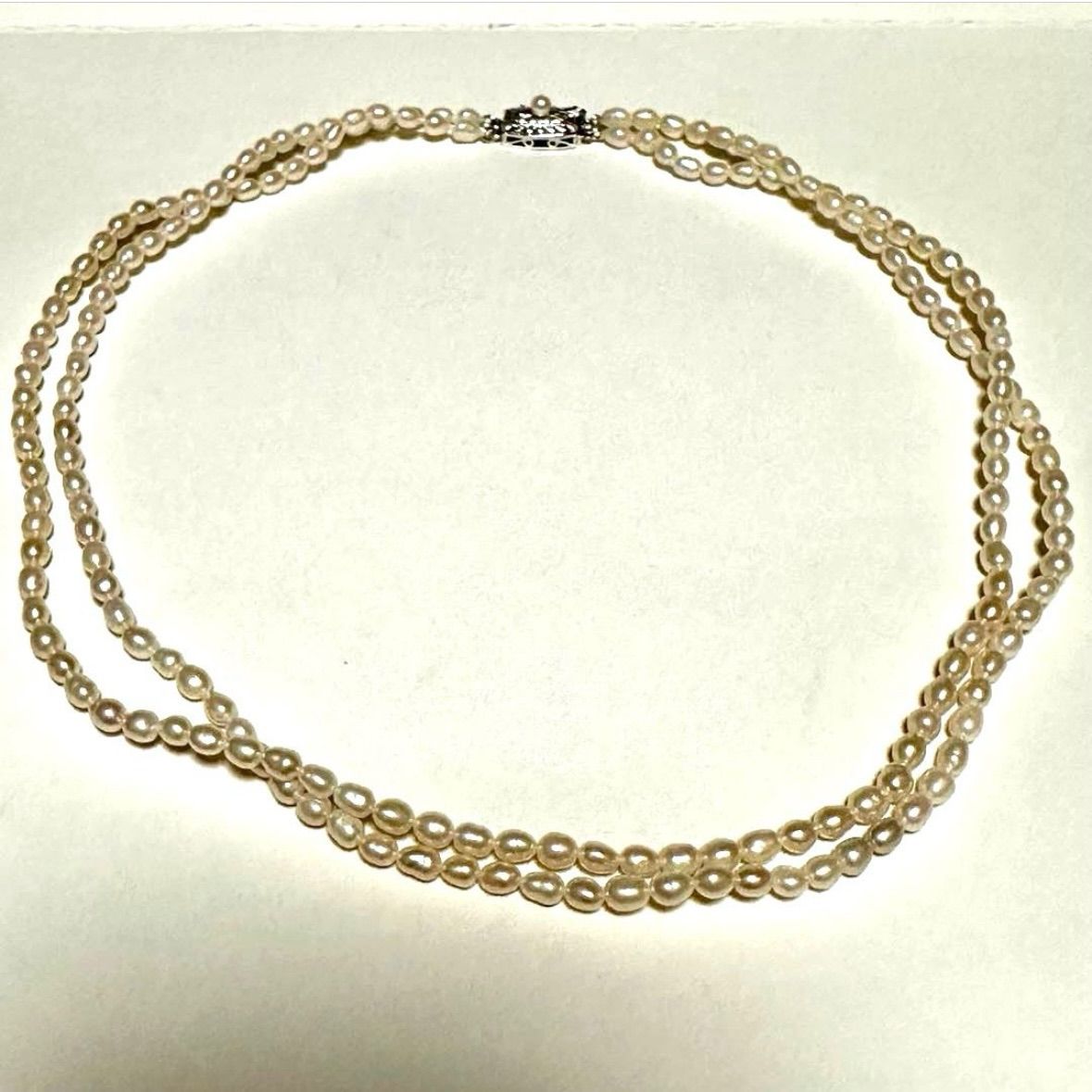 Tasaki Law two-strand white freshwater pearl necklace with silver clasp, 42.5 cm length