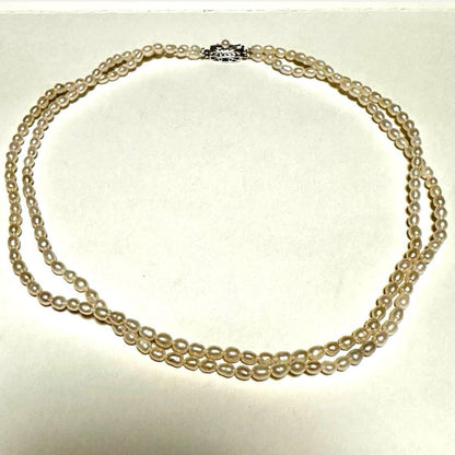 Tasaki Law two-strand white freshwater pearl necklace with silver clasp, 42.5 cm length