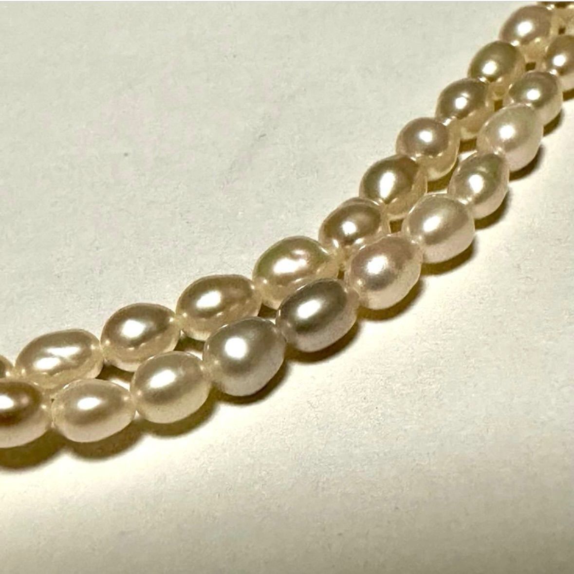Tasaki Law two-strand white freshwater pearl necklace with silver clasp, 42.5 cm length