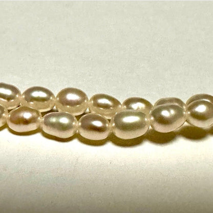 Tasaki Law two-strand white freshwater pearl necklace with silver clasp, 42.5 cm length