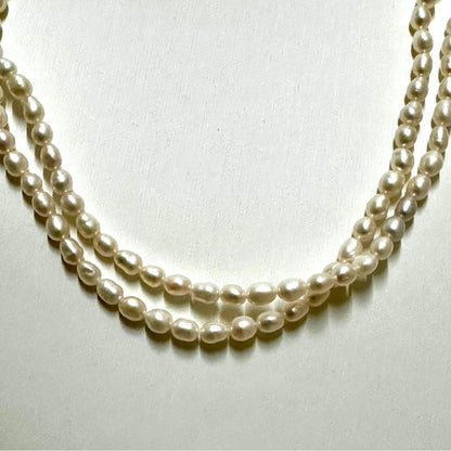 Tasaki Law two-strand white freshwater pearl necklace with silver clasp, 42.5 cm length