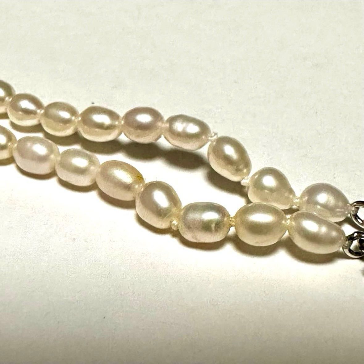 Tasaki Law two-strand white freshwater pearl necklace with silver clasp, 42.5 cm length