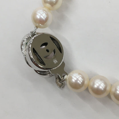 Tasaki Pearl Necklace featuring 7mm pearls in 19cm and 38cm lengths on display