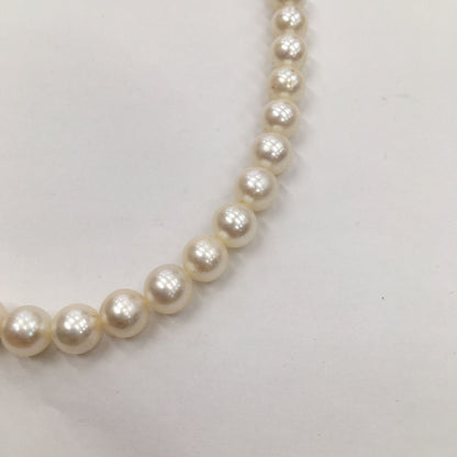 Tasaki Pearl Necklace featuring 7mm pearls in 19cm and 38cm lengths on display