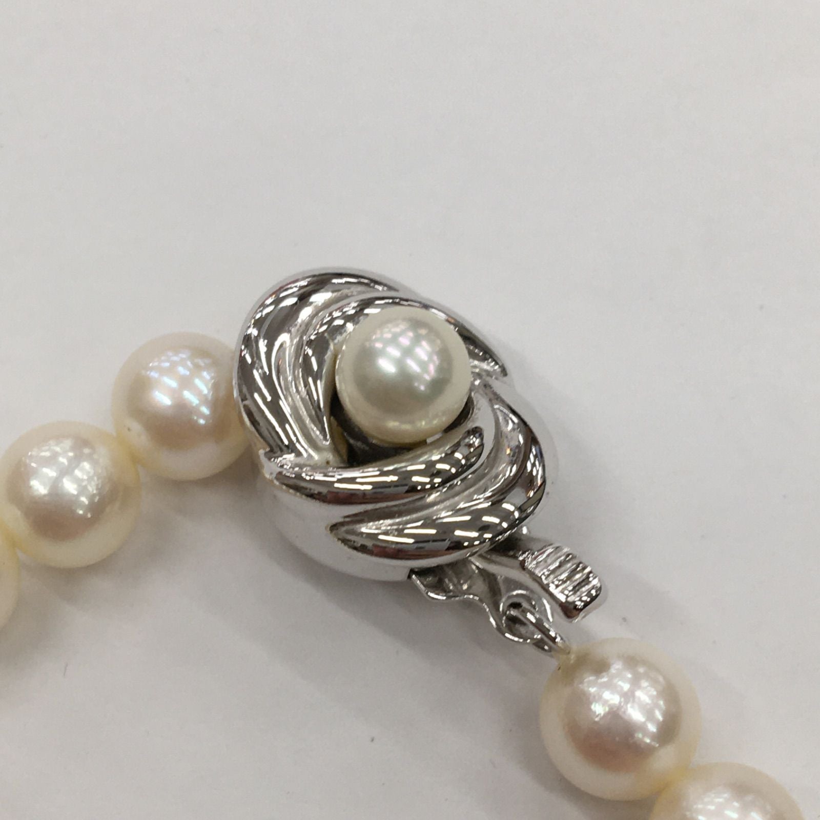 Tasaki Pearl Necklace featuring 7mm pearls in 19cm and 38cm lengths on display