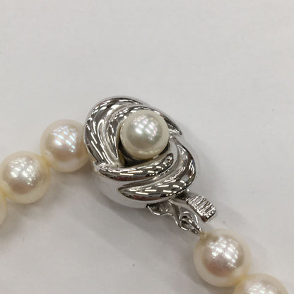 Tasaki Pearl Necklace featuring 7mm pearls in 19cm and 38cm lengths on display