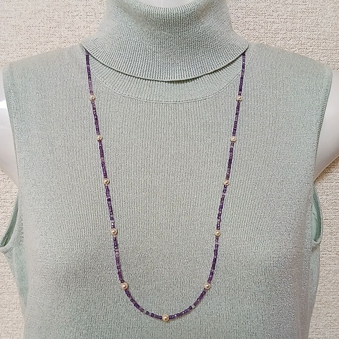 Akoya baby pearl and amethyst necklace with cream pearls and silver chain approximately 73 centimeters long