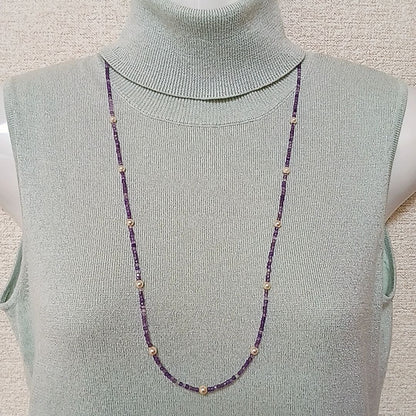 Akoya baby pearl and amethyst necklace with cream pearls and silver chain approximately 73 centimeters long