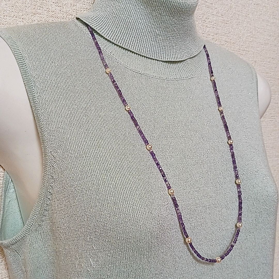 Akoya baby pearl and amethyst necklace with cream pearls and silver chain approximately 73 centimeters long