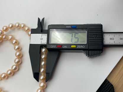 Akoya pink pearl necklace with 7.5mm diameter pearls measuring about 42 cm in length
