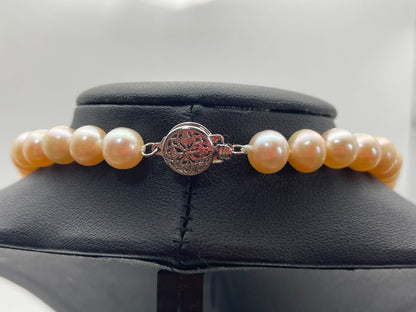 Akoya pink pearl necklace with 7.5mm diameter pearls measuring about 42 cm in length