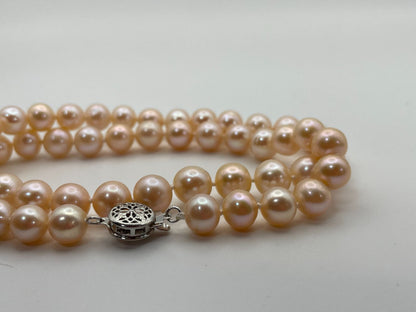Akoya pink pearl necklace with 7.5mm diameter pearls measuring about 42 cm in length