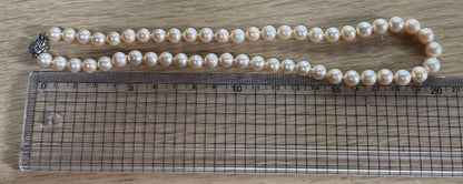 Akoya pink pearl necklace with 7.5mm diameter pearls measuring about 42 cm in length