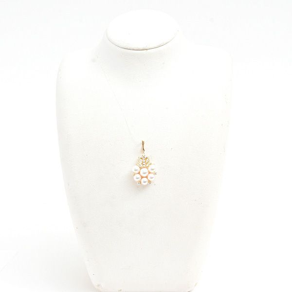 Mikimoto K18 gold pendant with six pearls and diamond accents measuring 21.2mm by 37.9mm