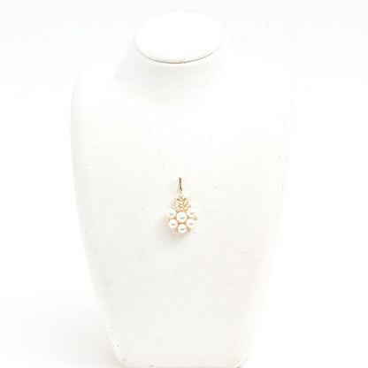 Mikimoto K18 gold pendant with six pearls and diamond accents measuring 21.2mm by 37.9mm