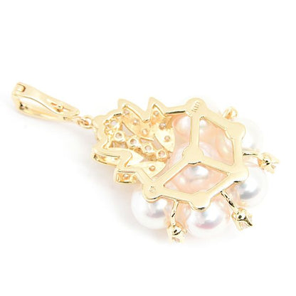Mikimoto K18 gold pendant with six pearls and diamond accents measuring 21.2mm by 37.9mm