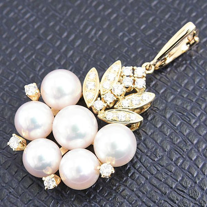 Mikimoto K18 gold pendant with six pearls and diamond accents measuring 21.2mm by 37.9mm