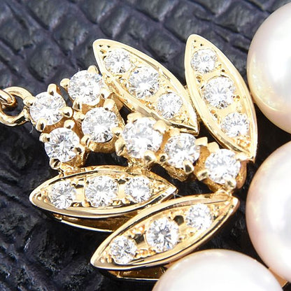 Mikimoto K18 gold pendant with six pearls and diamond accents measuring 21.2mm by 37.9mm