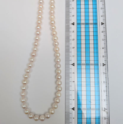 Long Akoya pearl necklace with round 6.5-7mm pink tone pearls and silver clasp, 82 cm length