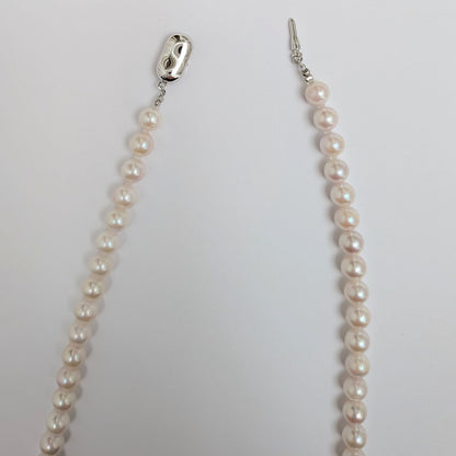 Long Akoya pearl necklace with round 6.5-7mm pink tone pearls and silver clasp, 82 cm length
