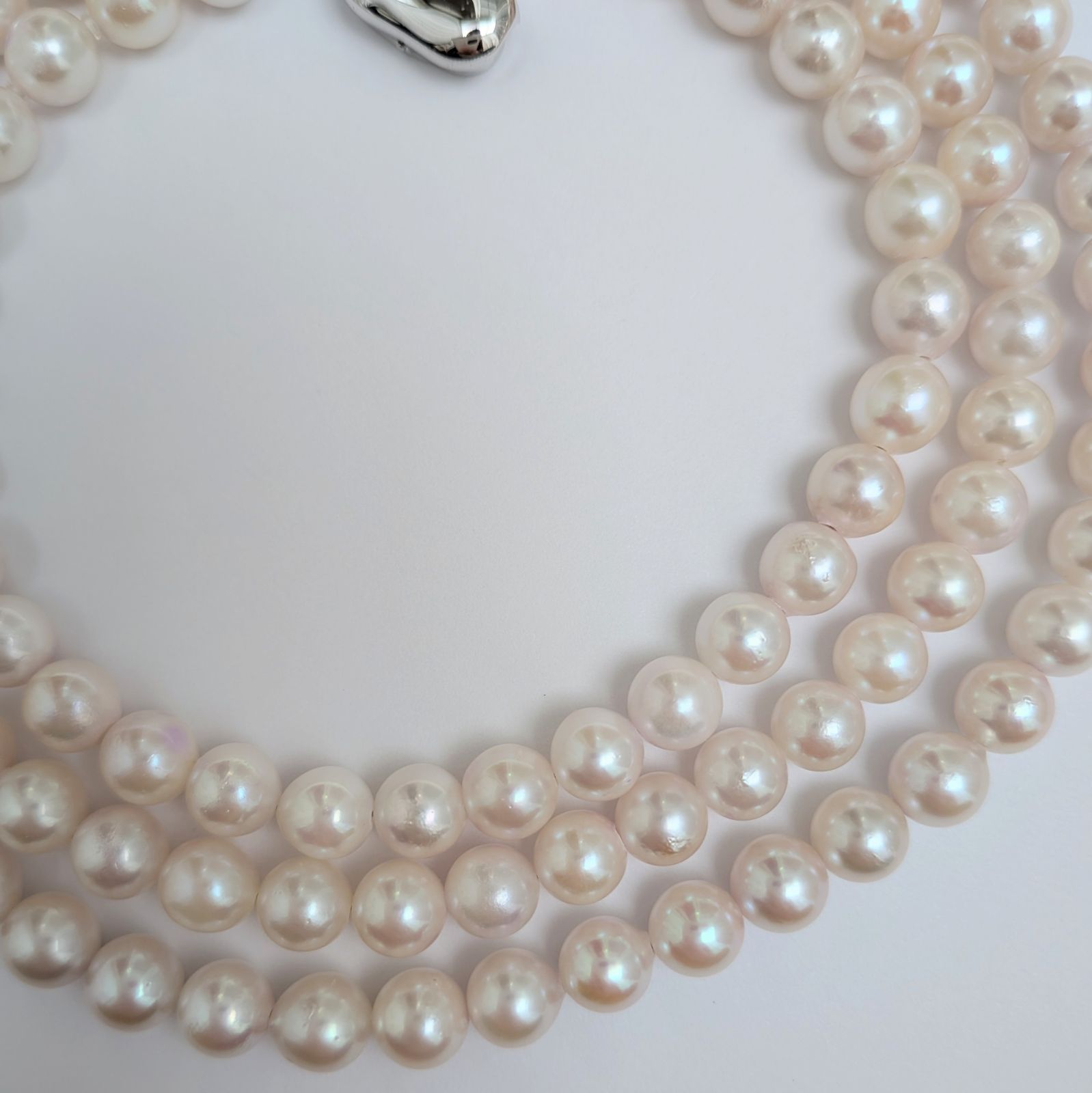 Long Akoya pearl necklace with round 6.5-7mm pink tone pearls and silver clasp, 82 cm length