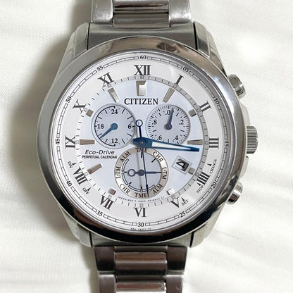 CITIZEN Eco-Drive Perpetual Calendar men's watch model E820-R006592 with silver case and black leather strap