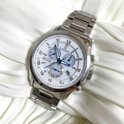 CITIZEN Eco-Drive Perpetual Calendar men's watch model E820-R006592 with silver case and black leather strap