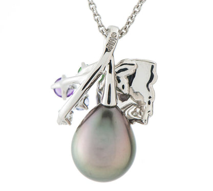 Mikimoto pendant necklace with drop-shaped black South Sea pearl and botanical motif in 18K white gold