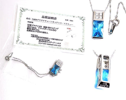 TASAKI necklace featuring a pearl, blue topaz gemstone, and 0.11ct diamonds on a 40cm chain
