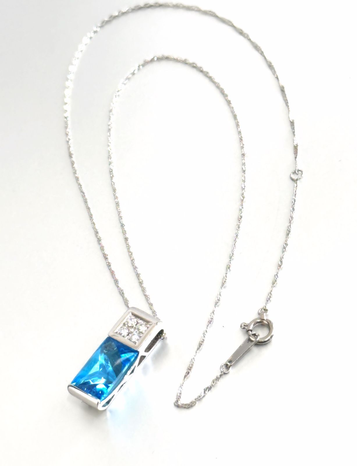 TASAKI necklace featuring a pearl, blue topaz gemstone, and 0.11ct diamonds on a 40cm chain