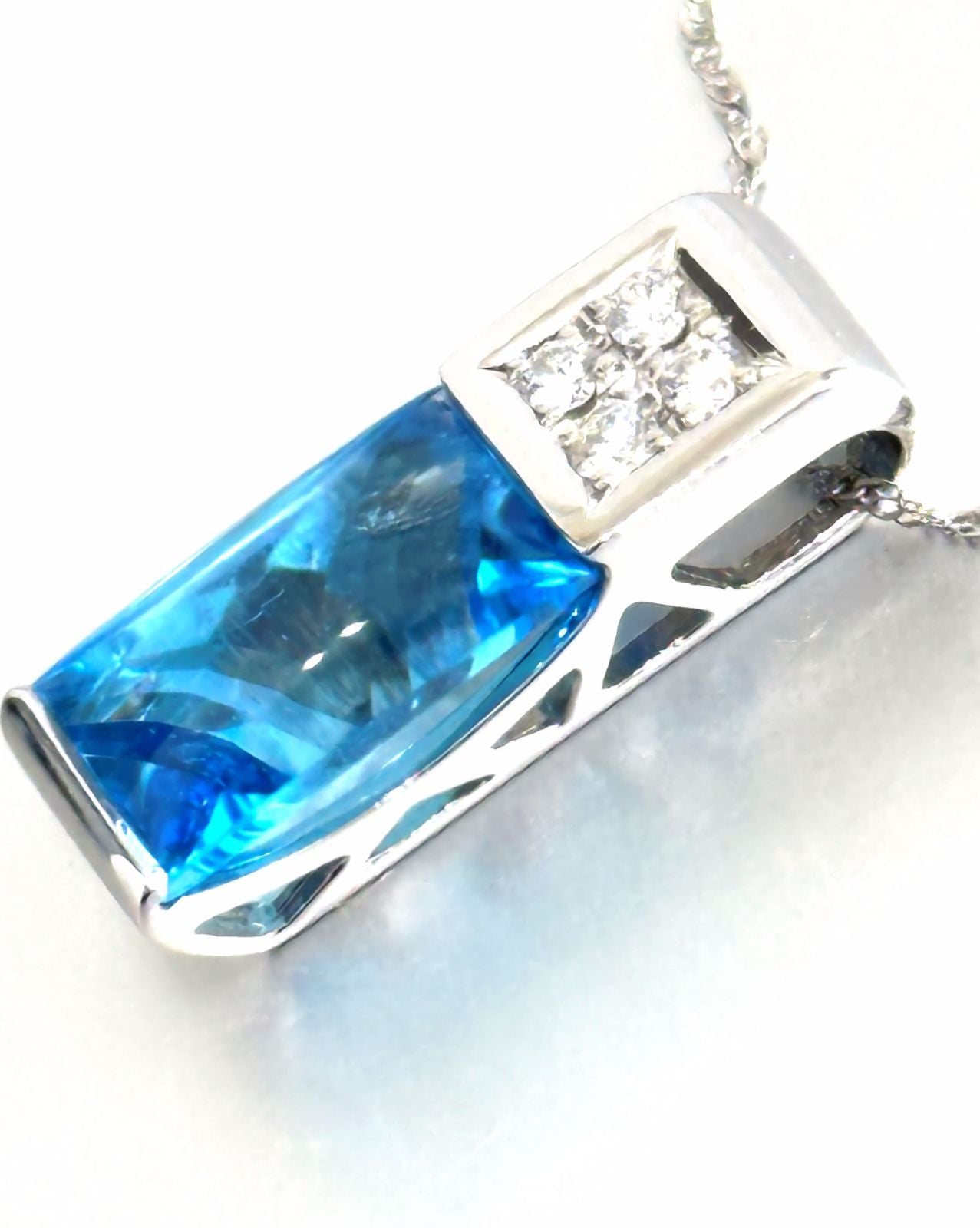 TASAKI necklace featuring a pearl, blue topaz gemstone, and 0.11ct diamonds on a 40cm chain