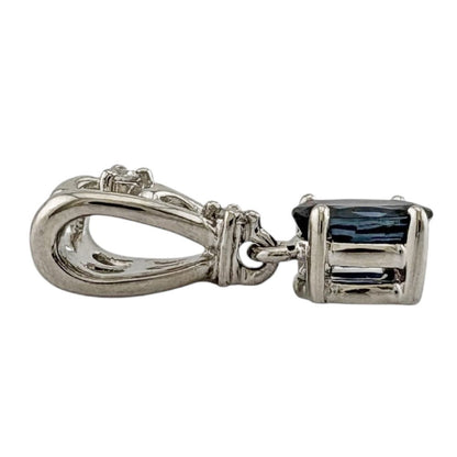 Tasaki Pt900 platinum pendant top featuring a blue sapphire for ladies in silver color weighing 2.4 grams