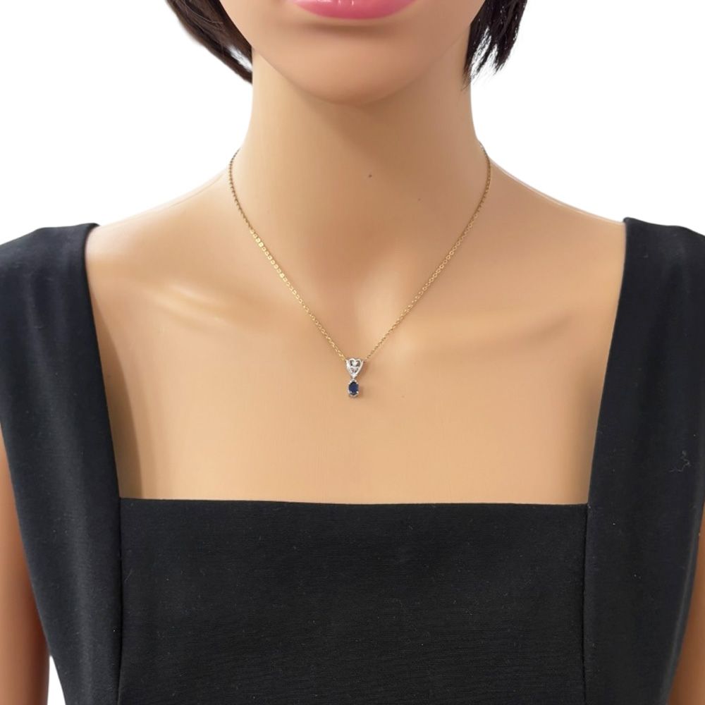 Tasaki Pt900 platinum pendant top featuring a blue sapphire for ladies in silver color weighing 2.4 grams