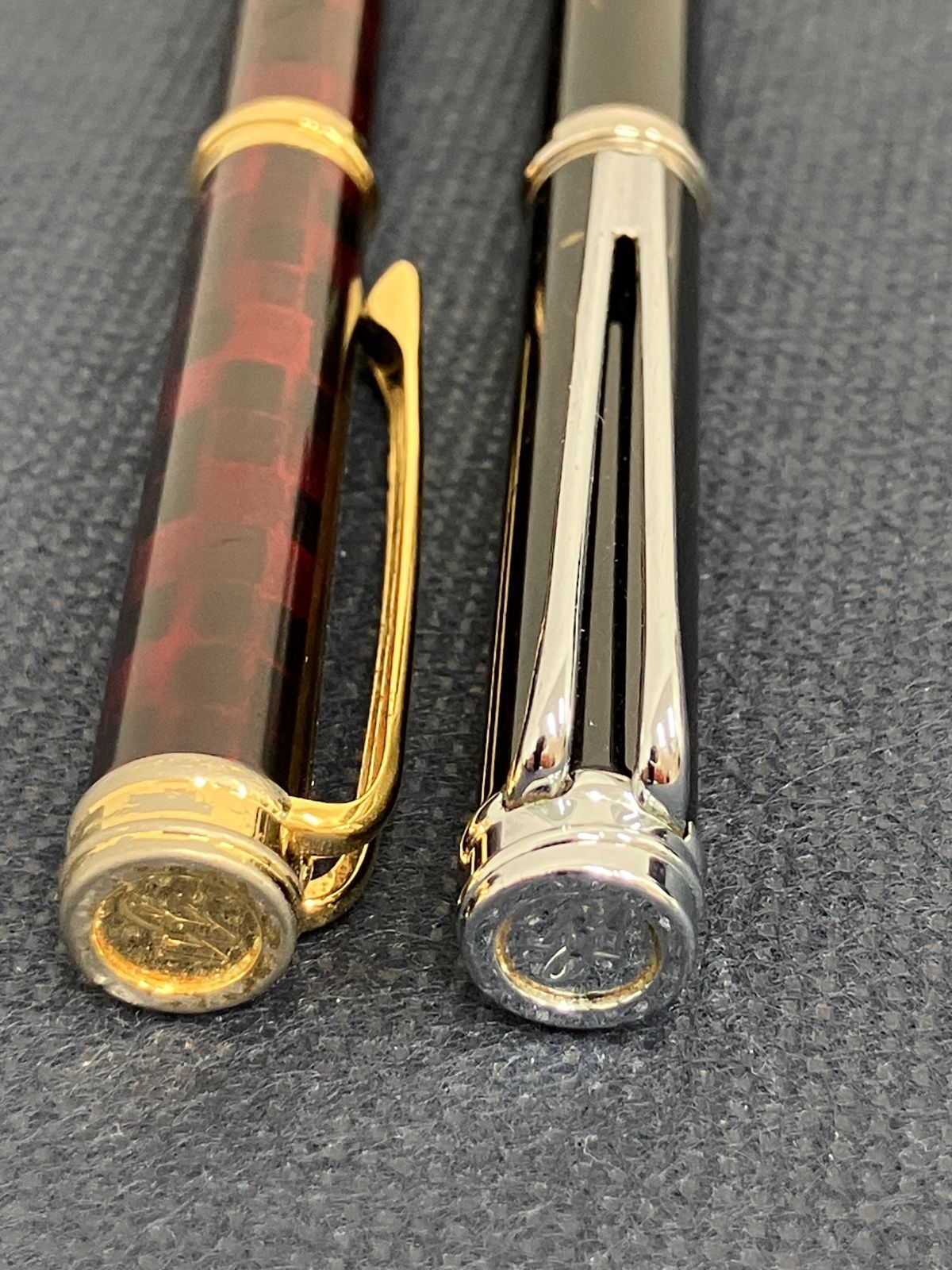 Waterman Harmonie ballpoint pen set with black twist pen and red marble twist pen, both 135mm long