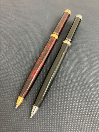 Waterman Harmonie ballpoint pen set with black twist pen and red marble twist pen, both 135mm long
