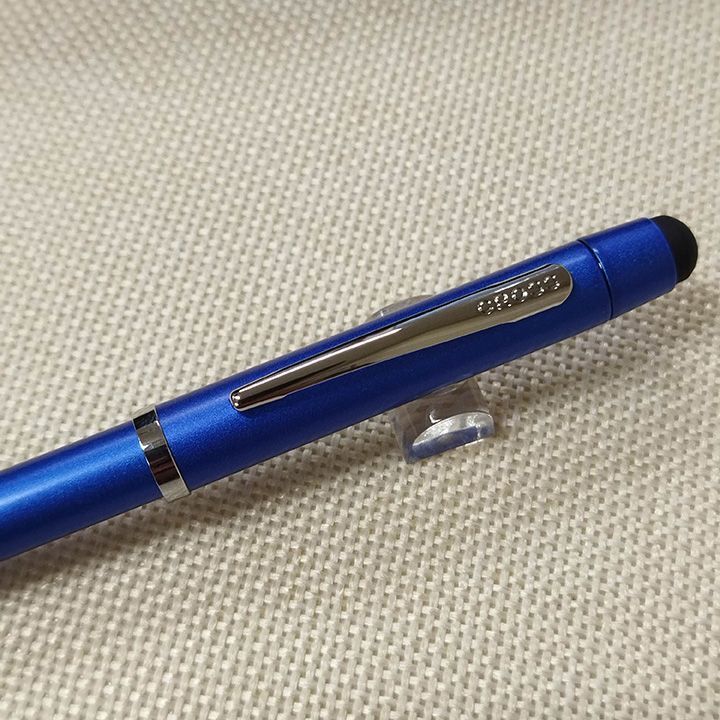 Cross multifunction pen with blue lacquer body, chrome clip, black and red ink, and mechanical pencil features