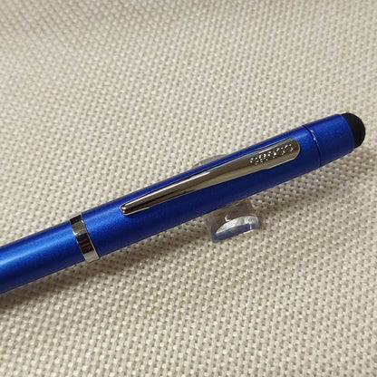 Cross multifunction pen with blue lacquer body, chrome clip, black and red ink, and mechanical pencil features