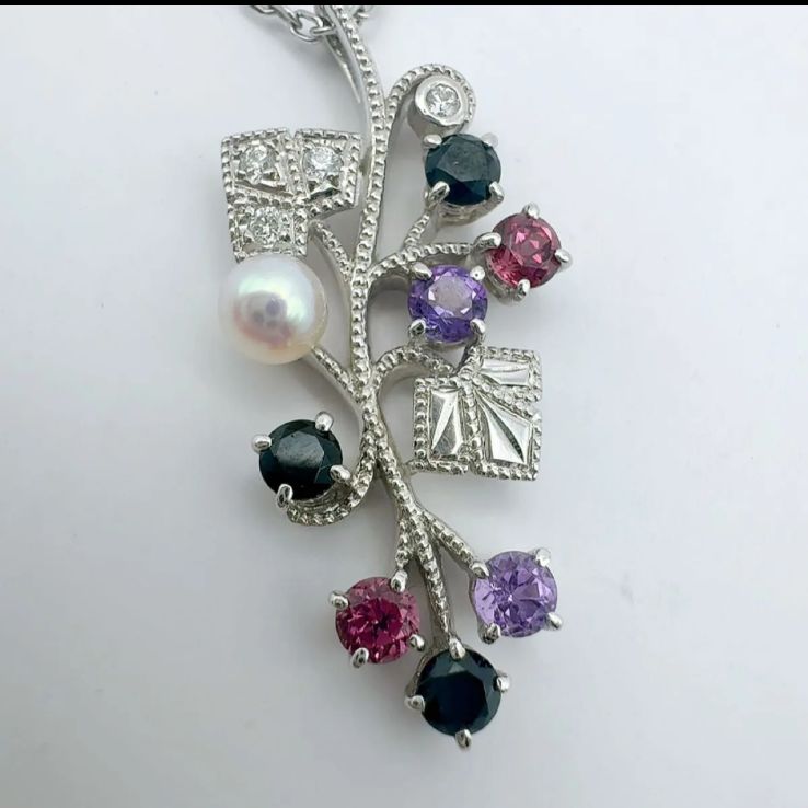 Mikimoto Akoya pearl necklace featuring amethyst, onyx, and tourmaline gemstones with 42cm chain length