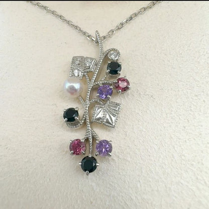 Mikimoto Akoya pearl necklace featuring amethyst, onyx, and tourmaline gemstones with 42cm chain length