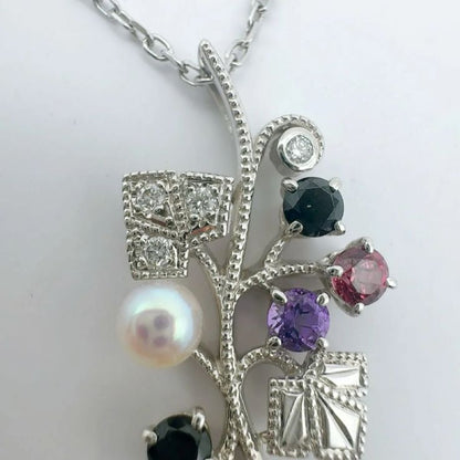 Mikimoto Akoya pearl necklace featuring amethyst, onyx, and tourmaline gemstones with 42cm chain length