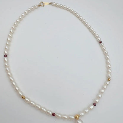 Tasaki pearl necklace with 4mm pearls, ruby gemstones, and K18 gold chain, 37cm length