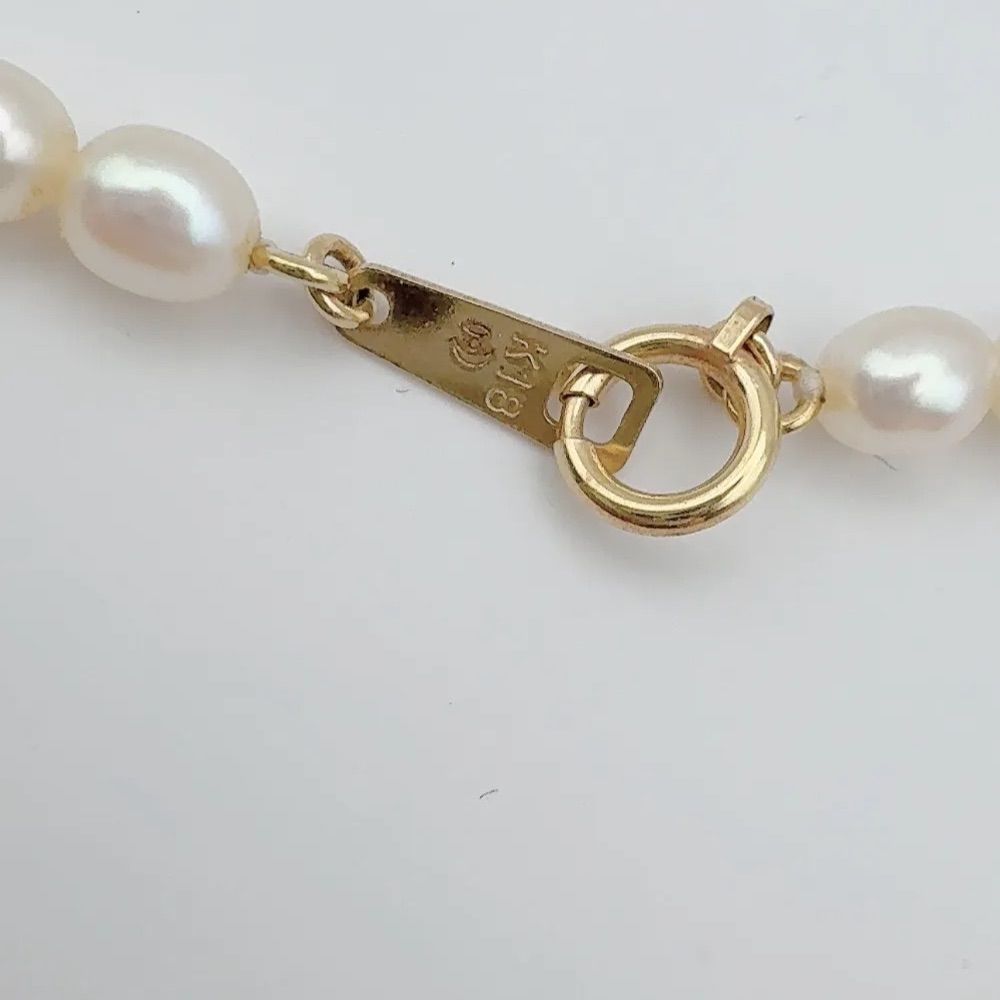 Tasaki pearl necklace with 4mm pearls, ruby gemstones, and K18 gold chain, 37cm length