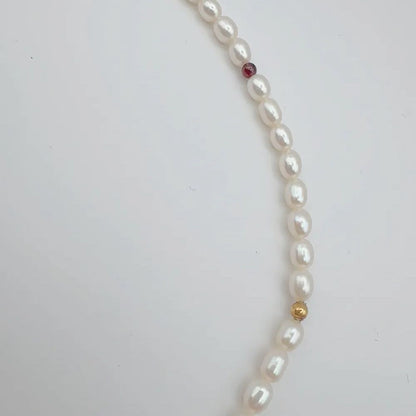 Tasaki pearl necklace with 4mm pearls, ruby gemstones, and K18 gold chain, 37cm length