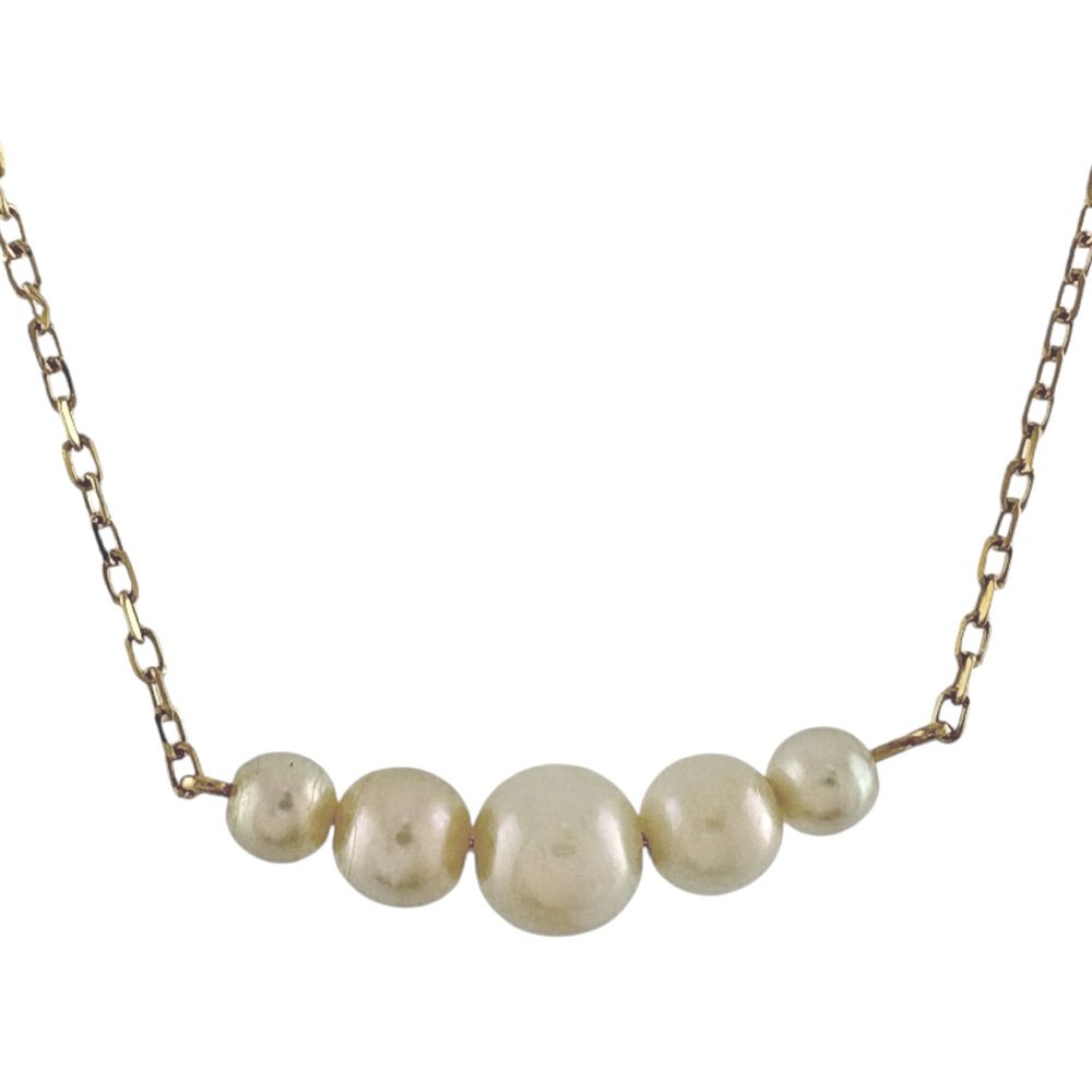 Mikimoto 18K yellow gold pearl necklace for ladies weighing 2.3 grams shown on white background