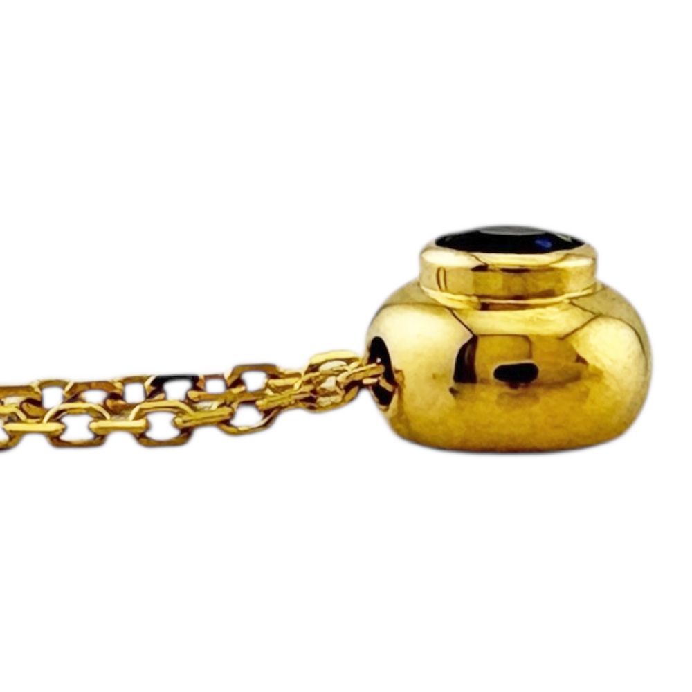 Mikimoto ladies necklace in 18K yellow gold with sapphire, weighing 2.6g, marked K18 on clasp, made in Japan