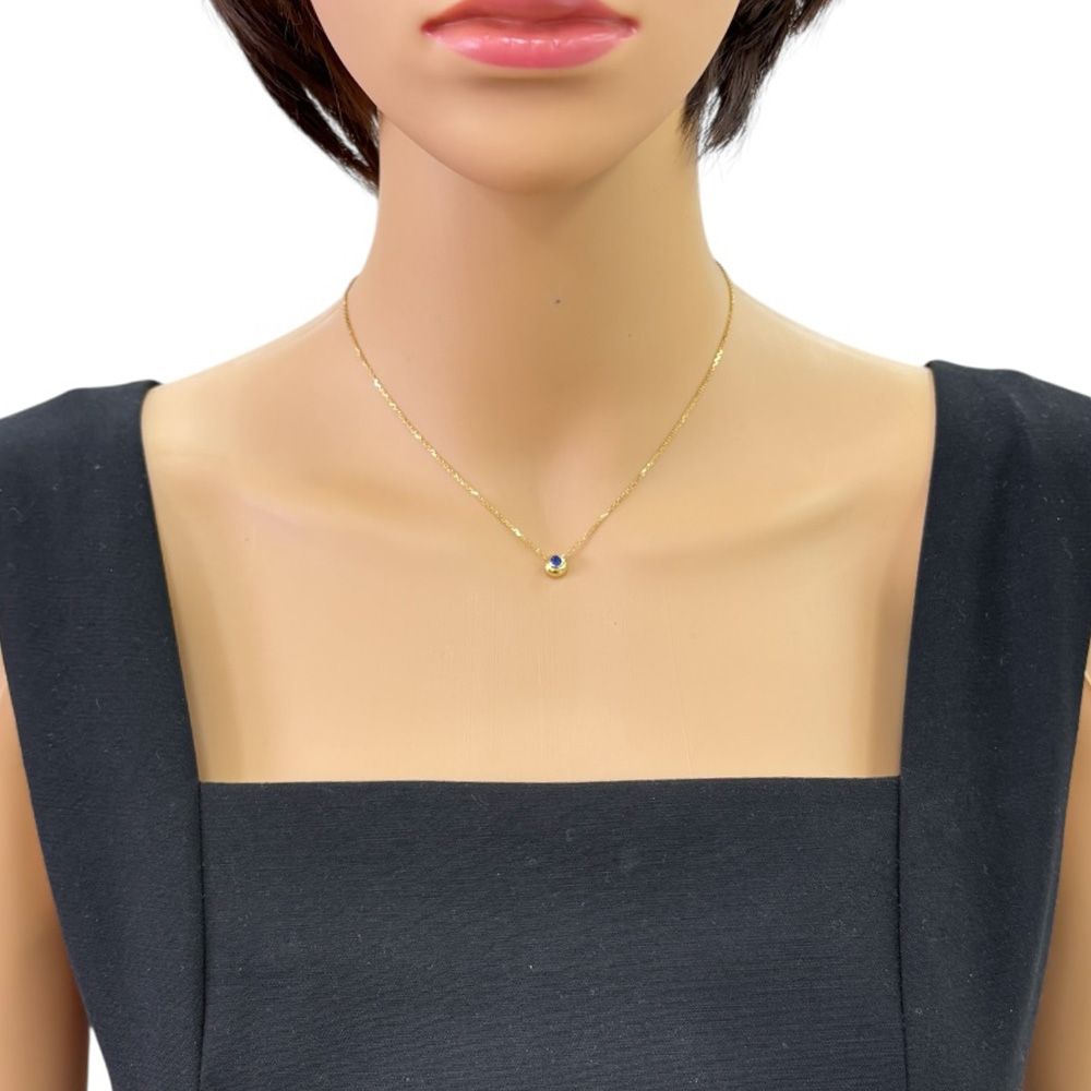 Mikimoto ladies necklace in 18K yellow gold with sapphire, weighing 2.6g, marked K18 on clasp, made in Japan
